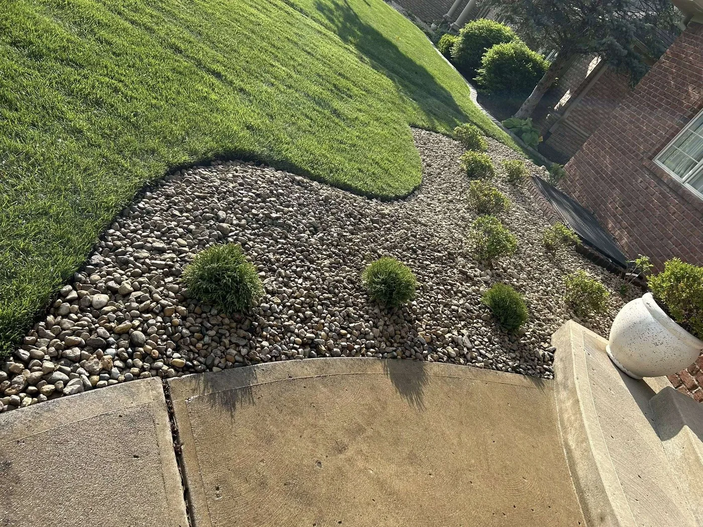 Grading and retaining wall work correcting drainage on a Bargersville, IN lot
