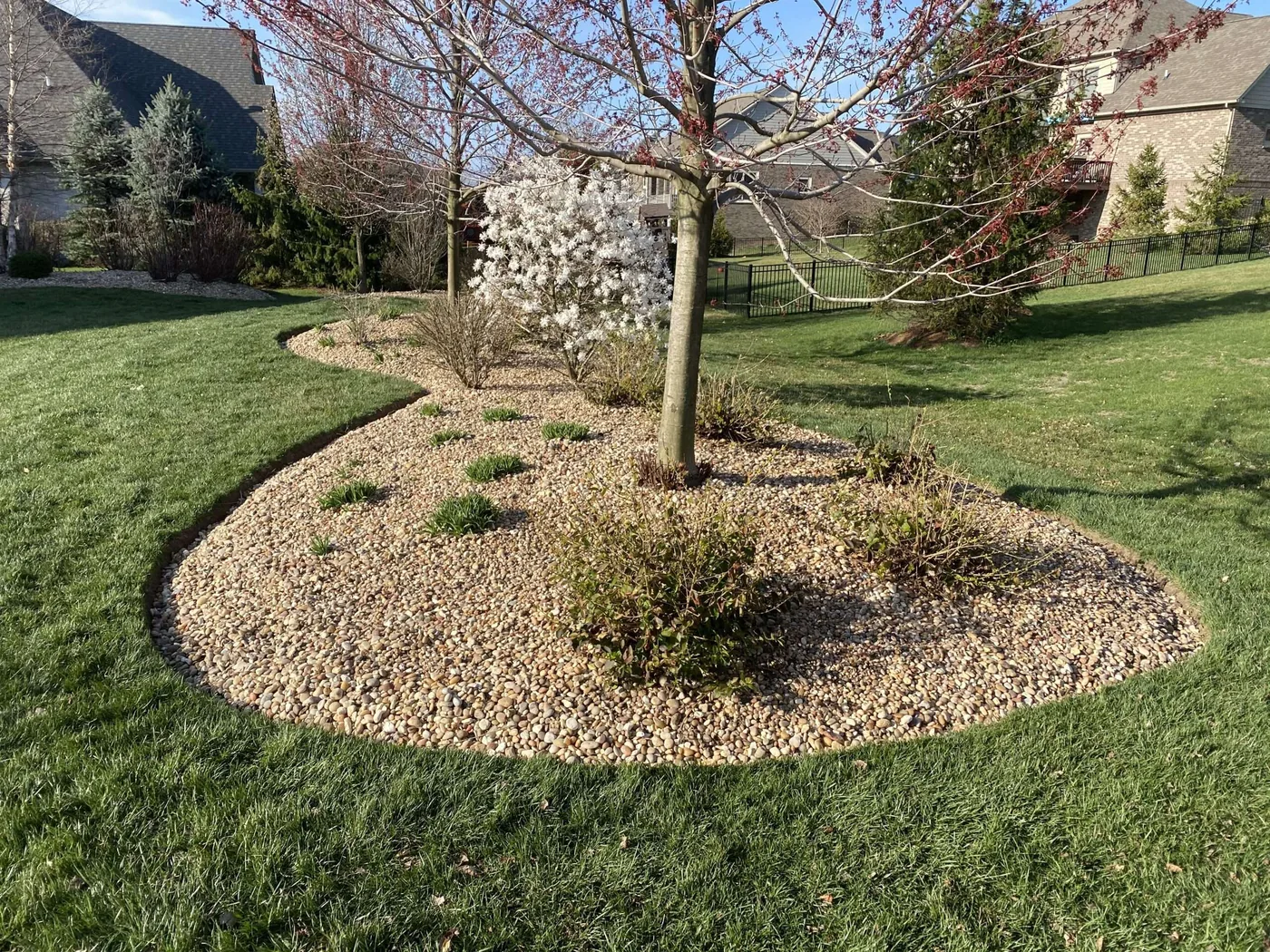 Mature landscape bed maintained at a Franklin, IN home