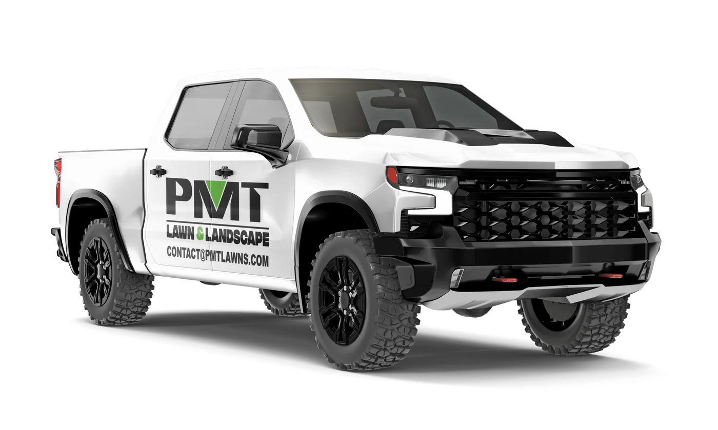 PMT Lawn & Landscape crew truck loaded for a seasonal cleanup near Indianapolis, IN