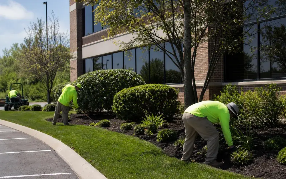 PMT crew maintaining shrub beds and turf at a commercial office property in Indianapolis, IN