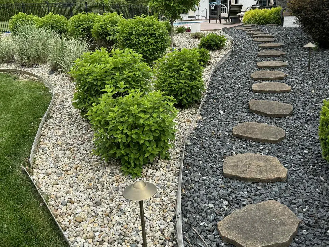 Terraced stone work built into a sloped yard in Mooresville, IN