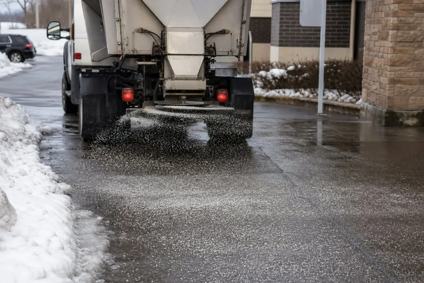 Salt and ice melt applied to a commercial walkway in Indianapolis, IN